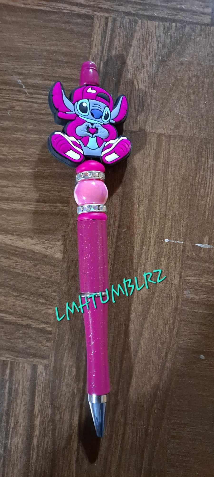 Stitch focal pink glitter pen