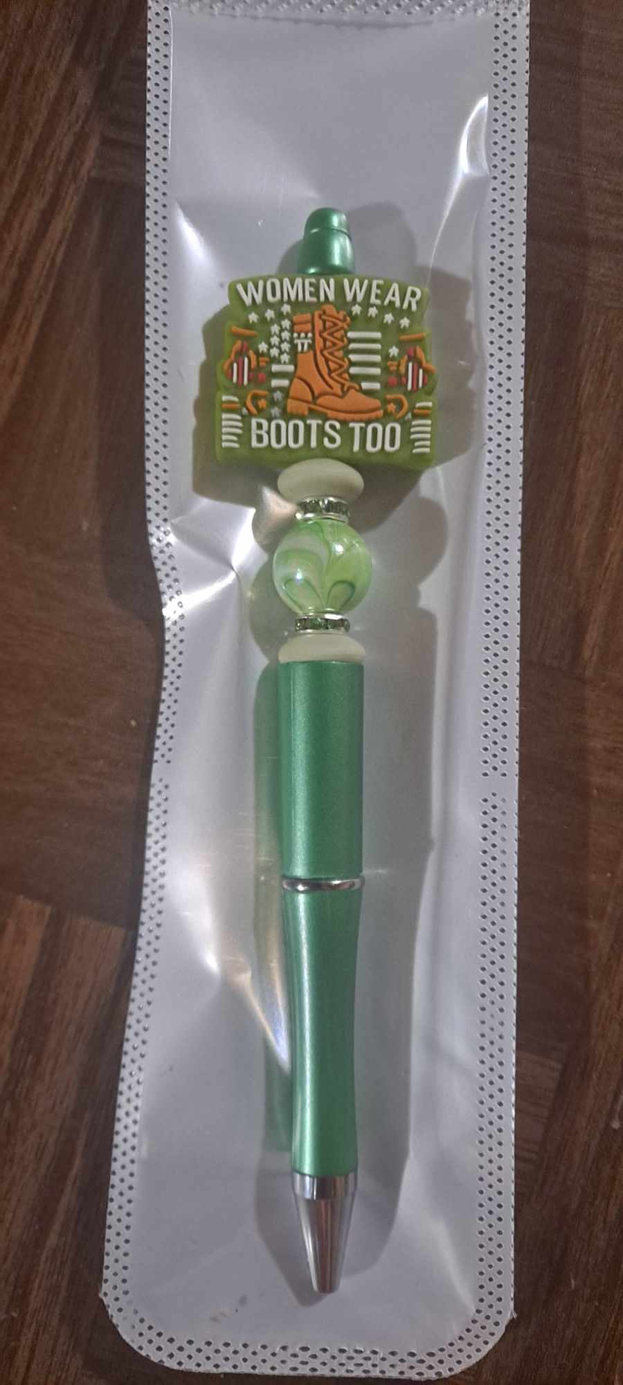 Women wear boots too focal green pen