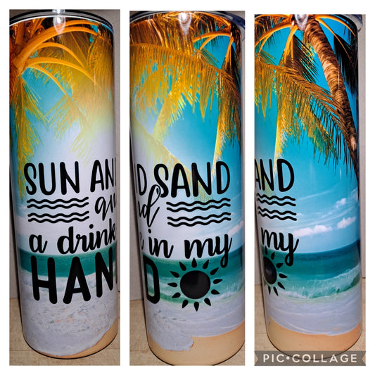 Sun and sand with a drink in my hand