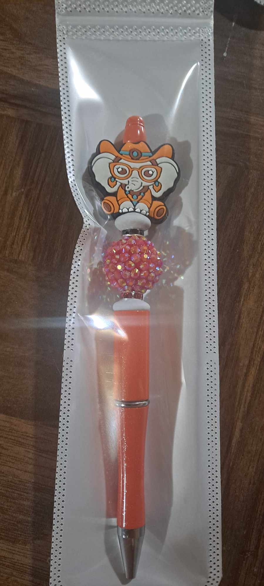 Ellie the elephant cowgirl focal orange pen