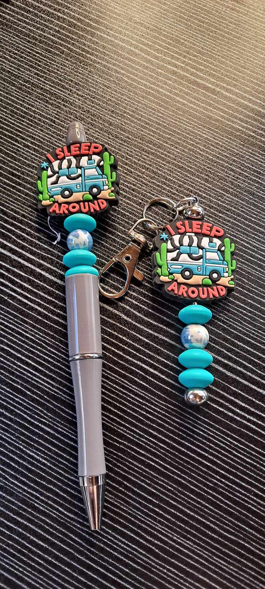I sleep around VW focal blue swirl pen and keychain set