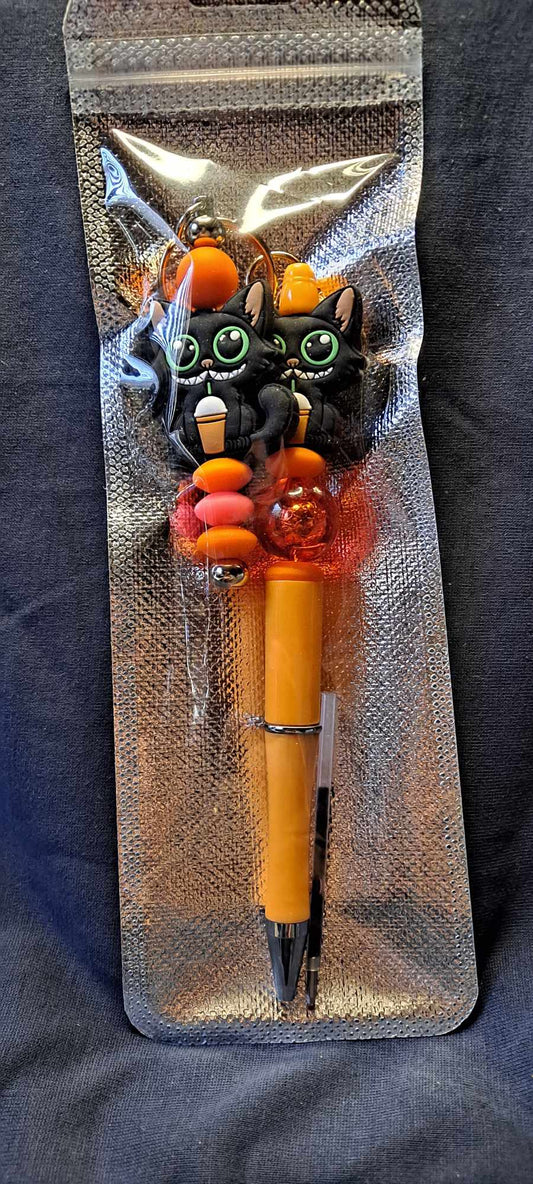 Black cat with frappe focal orange pen keychain set